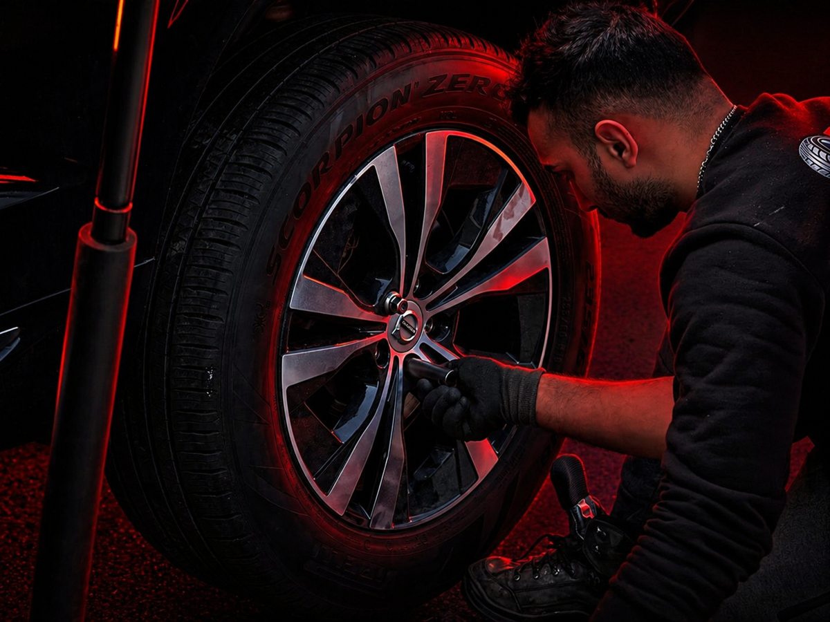 Rapid Tire GTA technician completing a careful wheel installation during mobile tire service